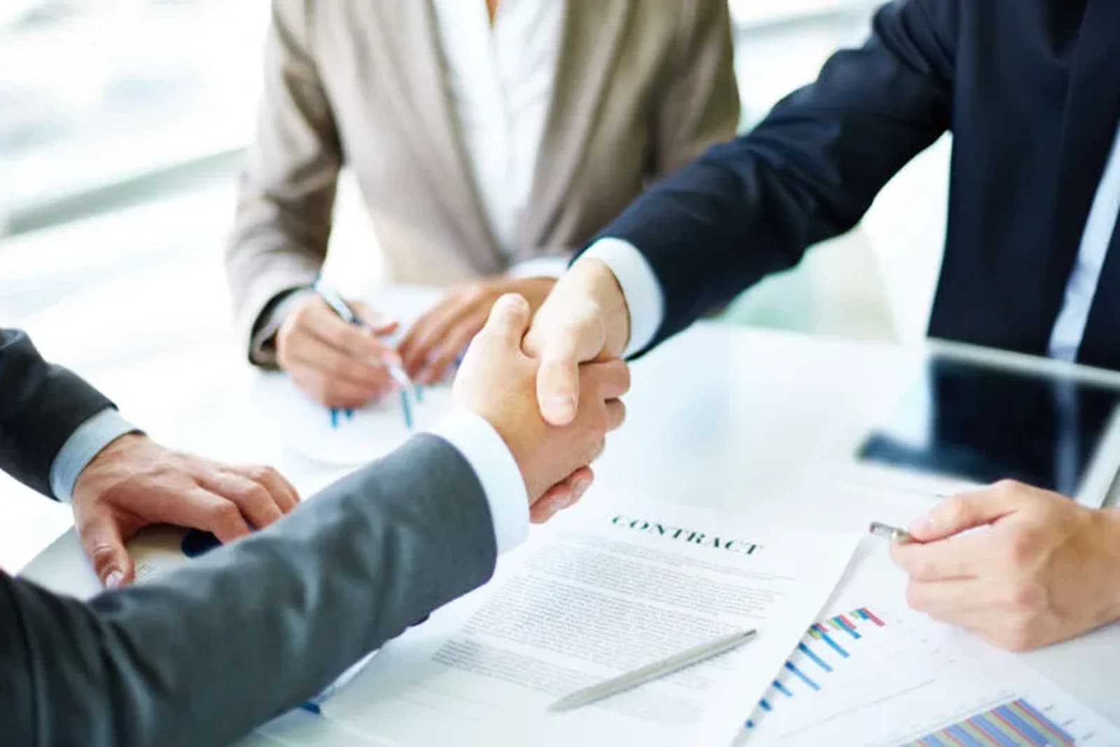 Business partners agreeing a digital growth engagement