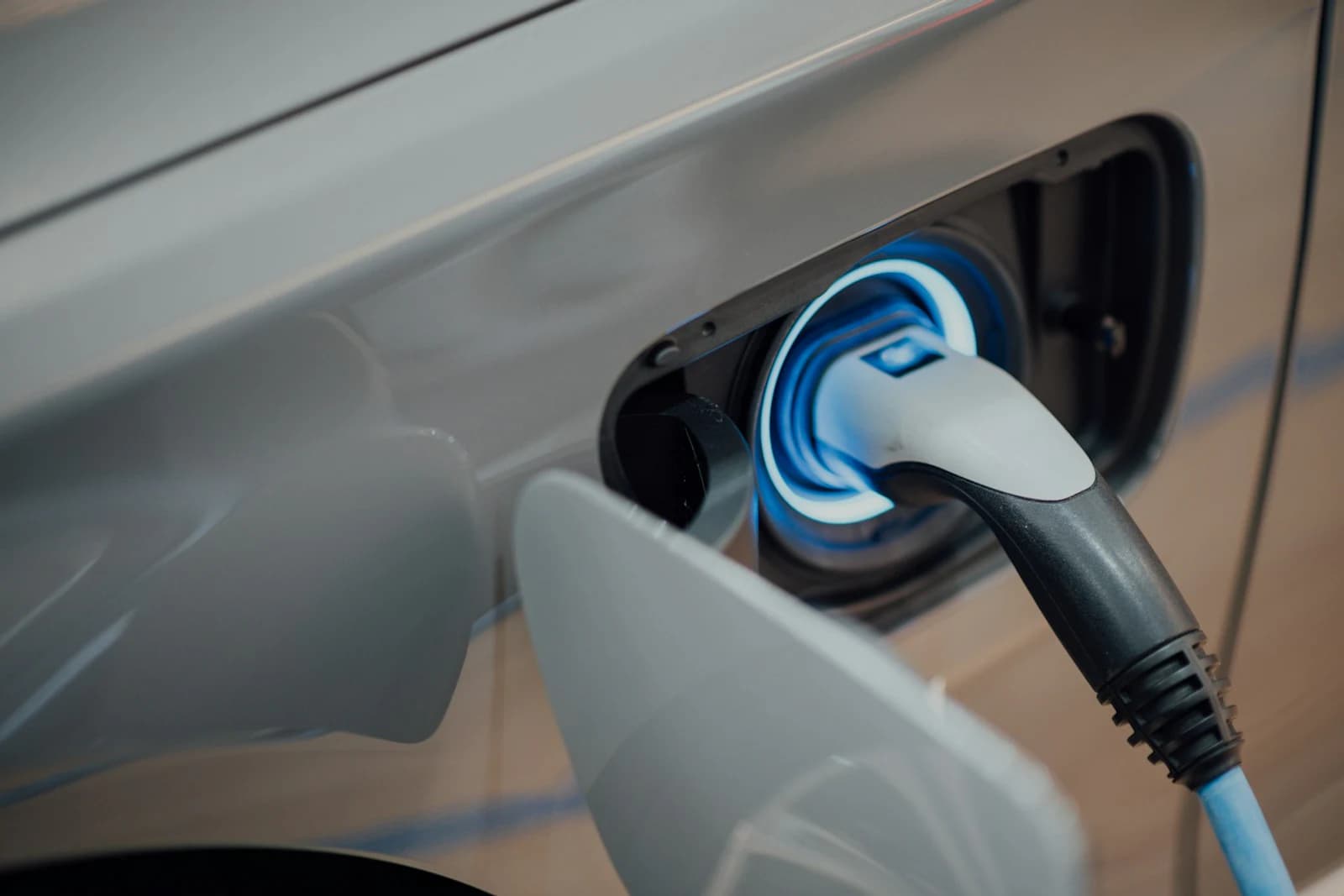 Electric vehicle connected to a charging point