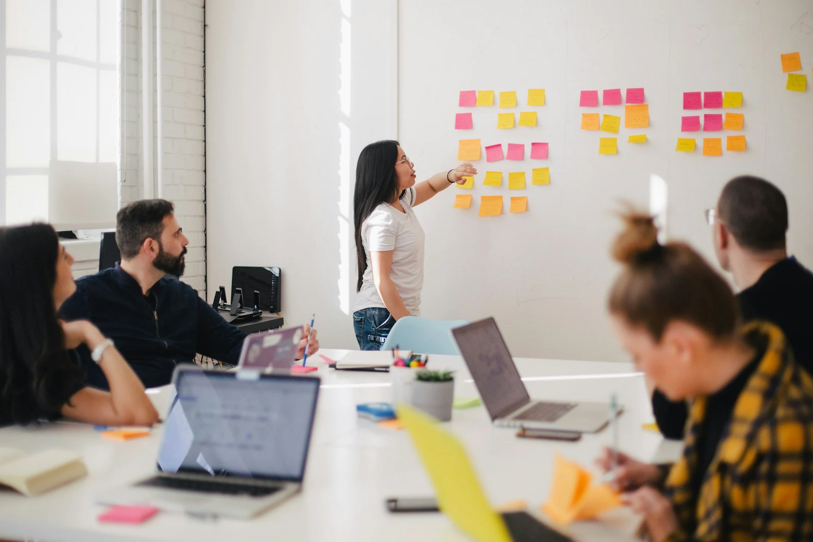 Creative team developing a digital campaign strategy